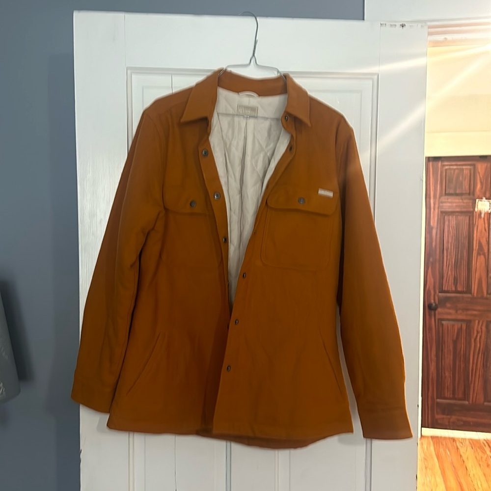 Woman’s button up jacket by Born Primitive